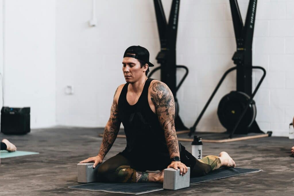 woman doing stretch after crossfit workout