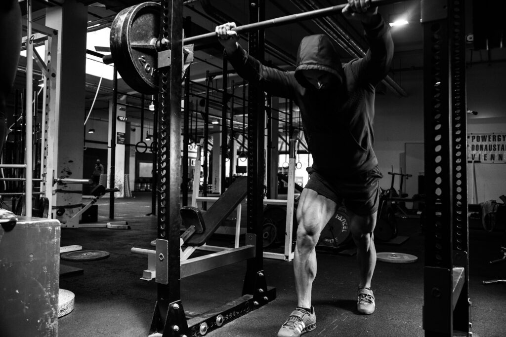 a man doing resistance training for hypertrophy